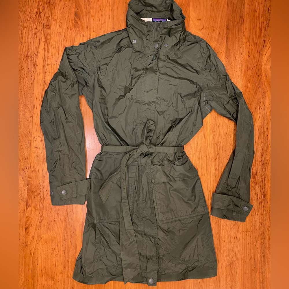 Patagonia 3/4 length dark green belted rain coat.